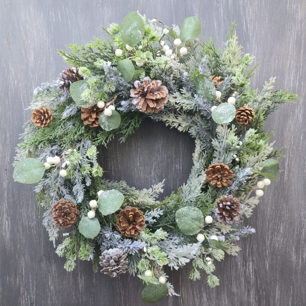 Handmade lush, artificial Winter Greenery Wreath With White And Brown Accents